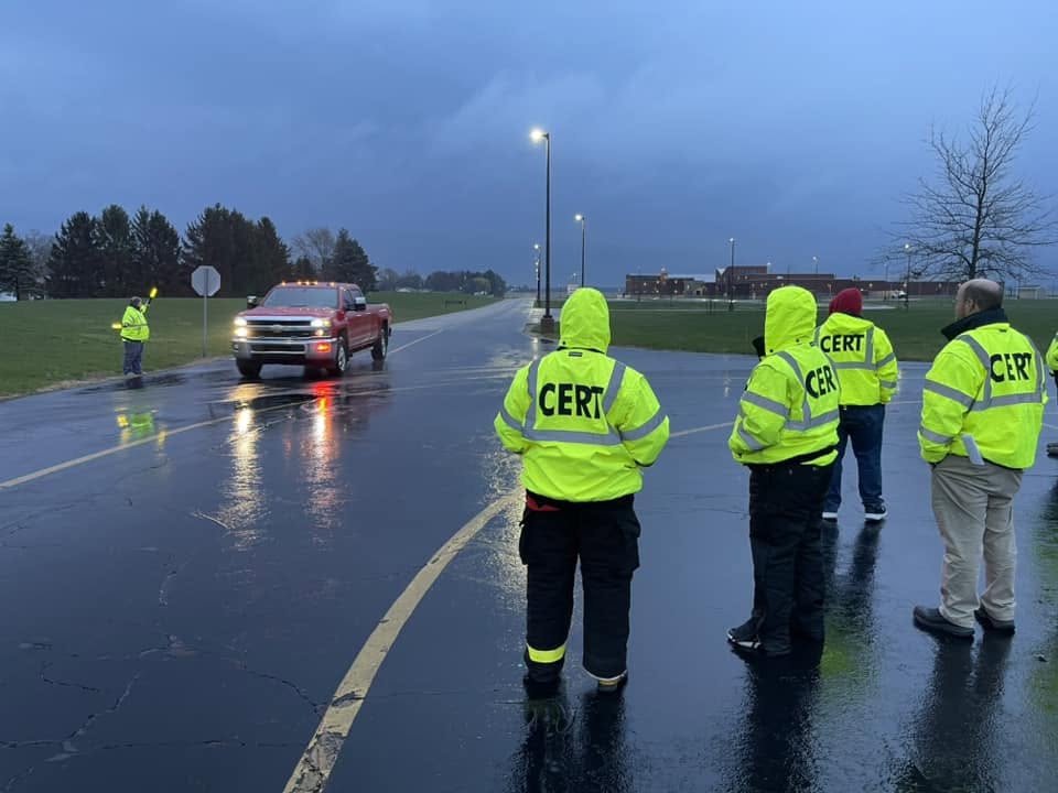Van Wert CERT volunteers directing vehicles safely in rainy conditions