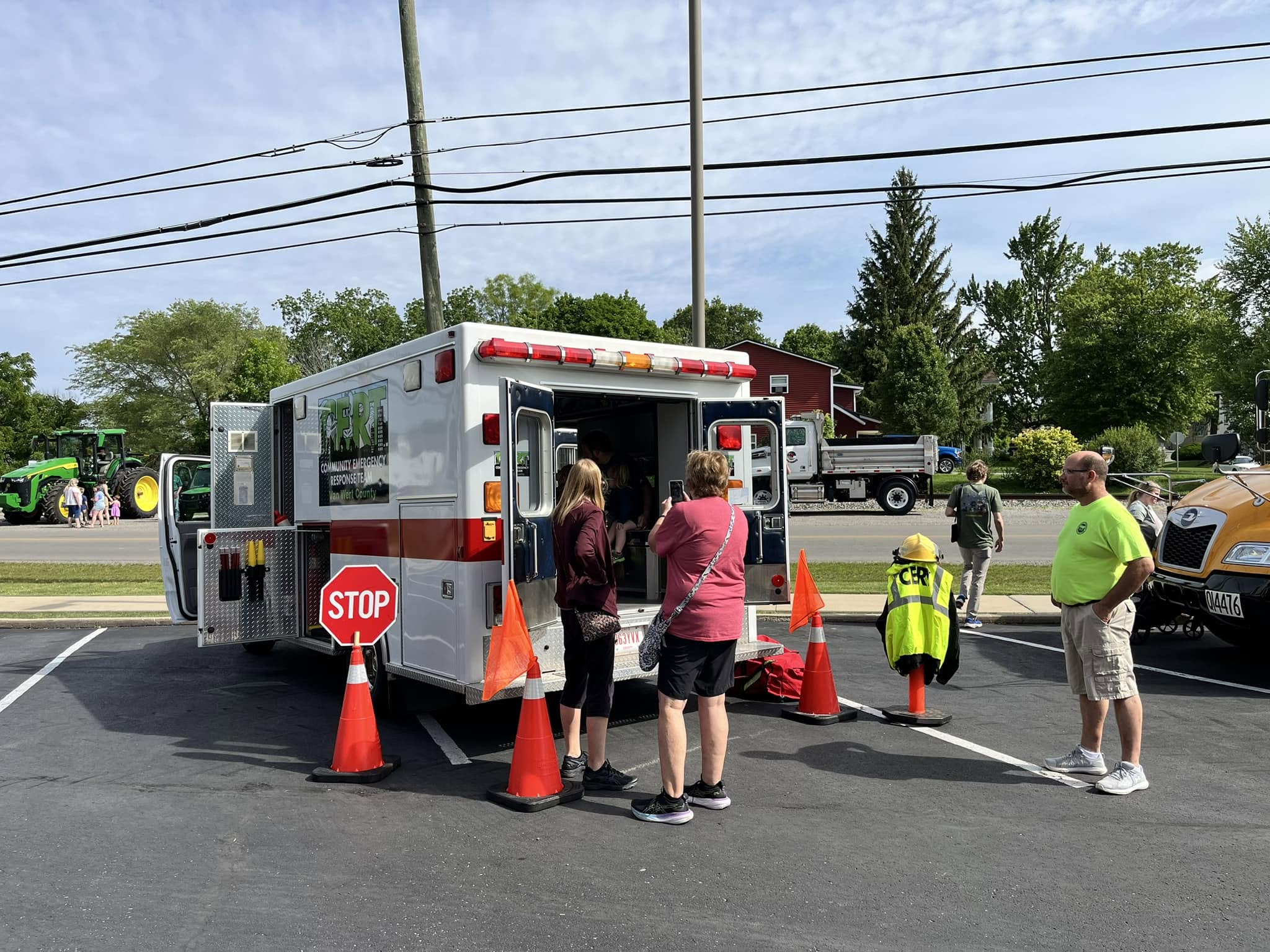 Community members visiting a Van Wert CERT vehicle at a public event